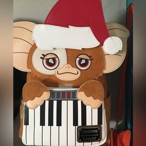 NWT gizmo with wallet